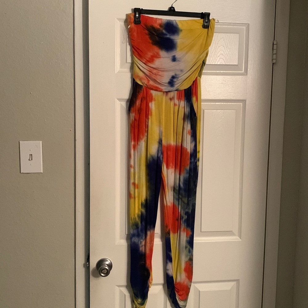 Tie dye romper with pockets.